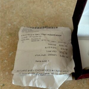 Riddles 1/10 carat diamond and gold hoops.